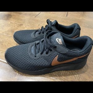 Women’s Black Nikes (size 7)
